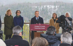 Federal officials gathered in Wakefield on March 31 to launch Canada's new $3.8-billion nature strategy. From left: Sophie Chatel, Joanne Thompson, Prime Minister Mark Carney, Julie Dabrusin and Nathalie Provost. Photo: Courtesy