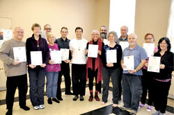Blaise T. Ryan (centre) with new qigong instructors (from left) Rick Wedge, Diana Durnford, Nicolas Hanssens, Monique Massé, Marc-André Blanchard,
Violette-Lise Duguay, Daniel Aarons, Naomi Sparrow, Serge Picard, François Leblanc, Bernadette Murray, Arlene Cybulskie. They were certified in Aylmer on
March 26, after completing a six-month, 200-hour teacher training, given by Mr Ryan, Aylmer resident and local qigong and tai chi teacher.
Photo: William Pryor