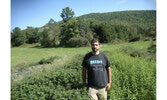  Kayoki Whiteduck standing in herbal fields. 